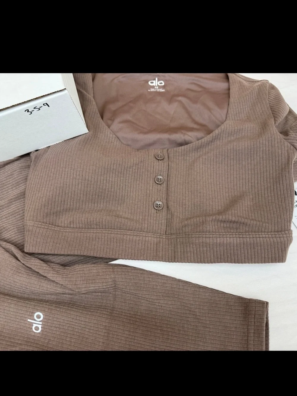 ALO Yoga Ribbed Henley Crop Top in Taupe Brown with matching ribbed leggings